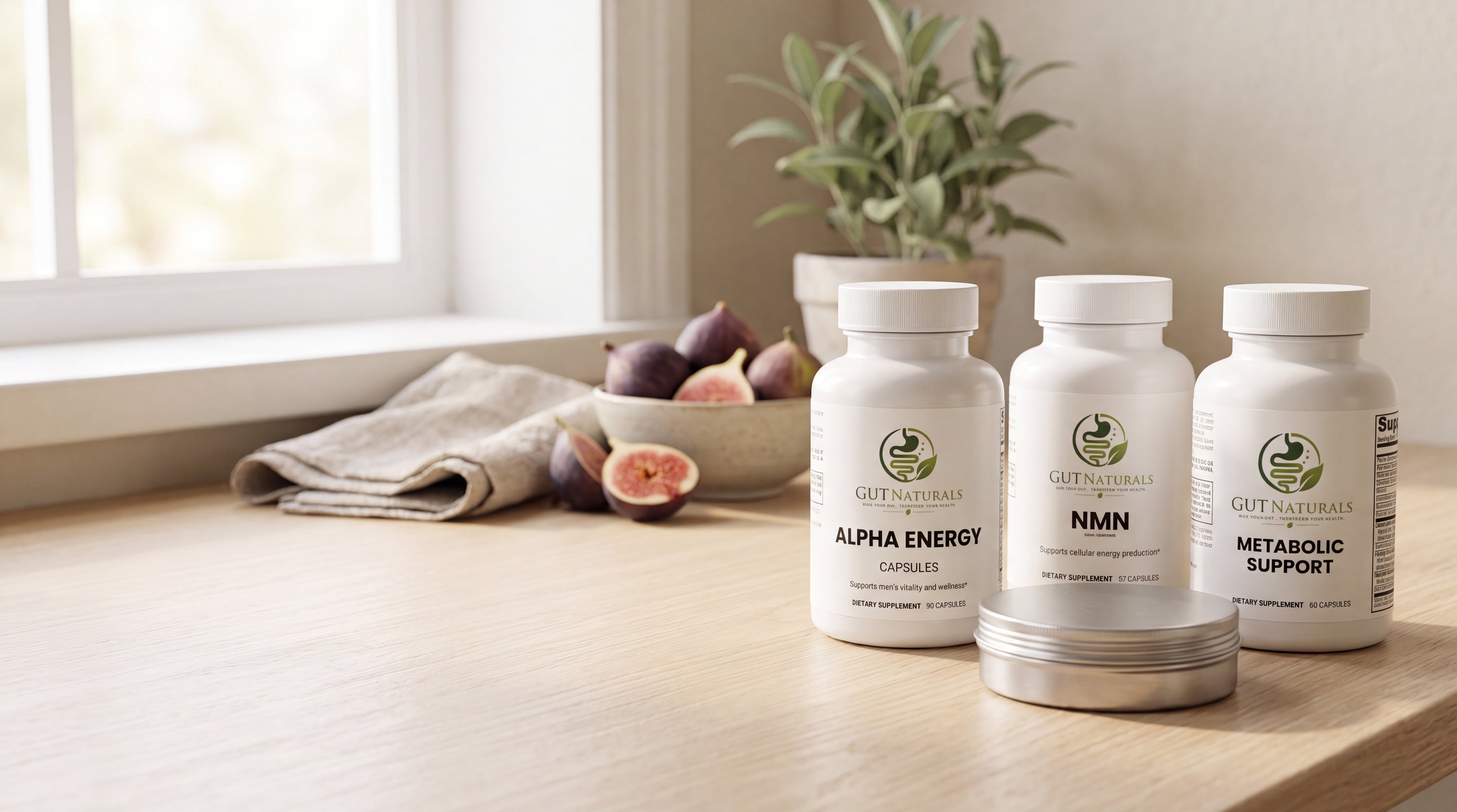 GutNaturals Alpha Energy, NMN and Metabolic Support bottles on a sunlit oak kitchen counter
