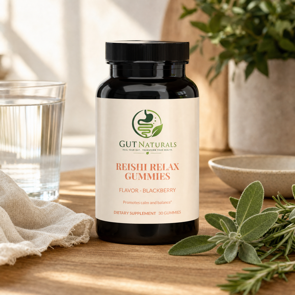 GutNaturals Reishi Relax Gummies on a sunlit oak kitchen counter with sage and rosemary