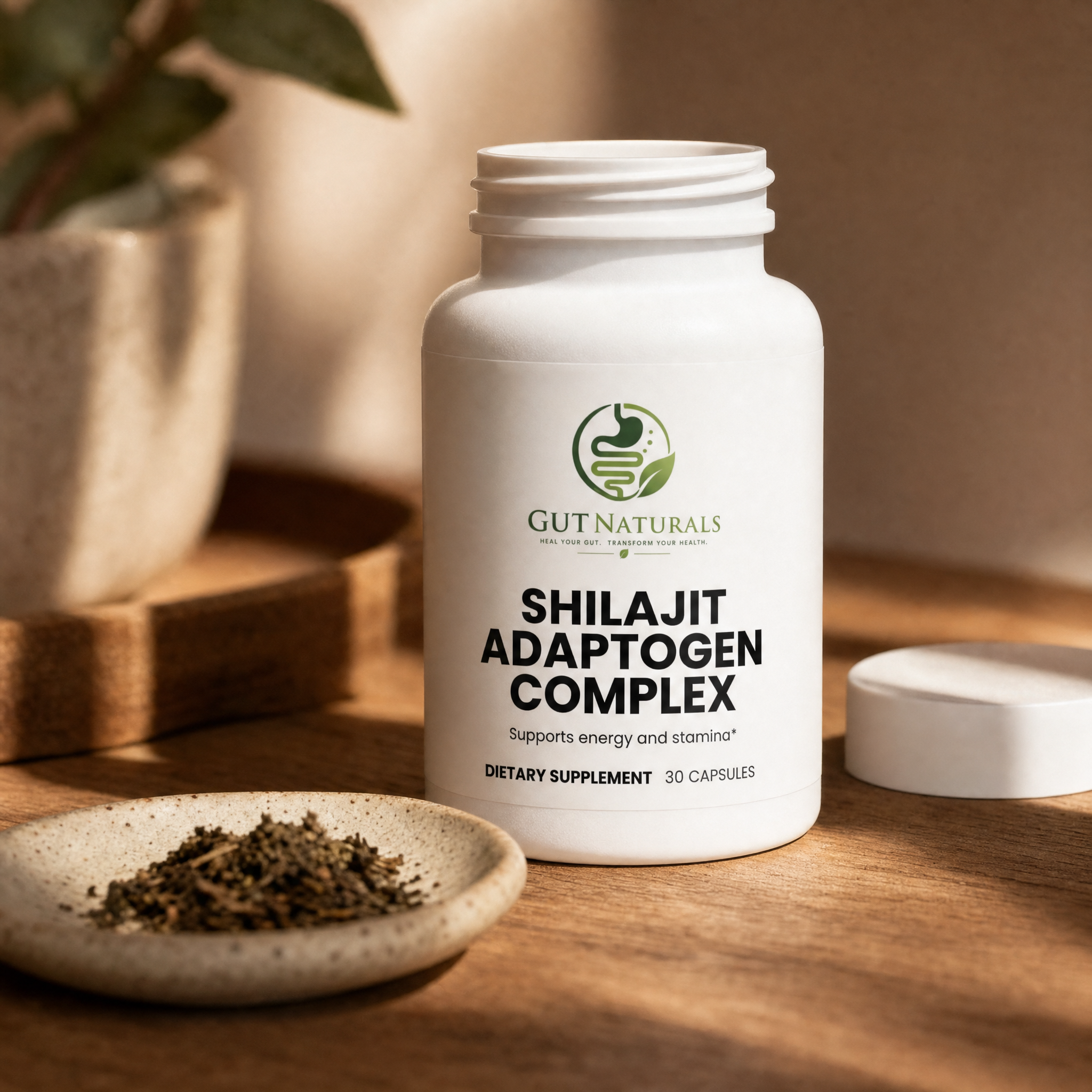 GutNaturals Shilajit Adaptogen Complex open with its contents in a ceramic dish