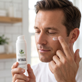 Man applying Peptide Eye Gel-Cream under eye